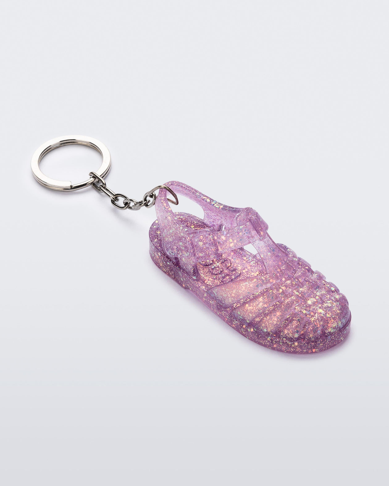 Angled view of glitter lilac Possession keyring