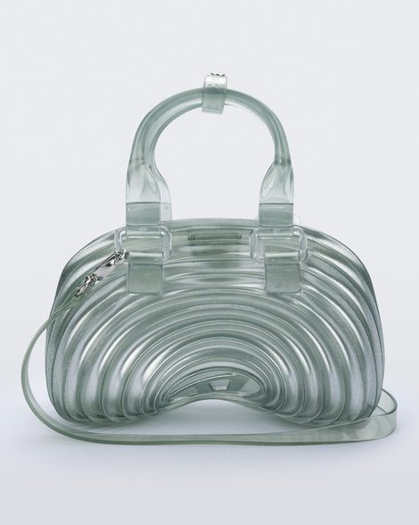 Back view of a transparent blue Quantum Dome + Diesel bag with hand strap and shoulder strap