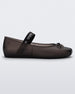 Side view of a Melissa Sophie ballet flat in black with M-logo strap and bow applique
