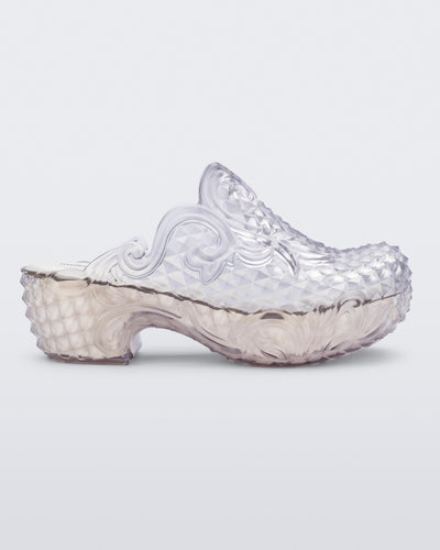 Side view of a clear Court Clog + Y/Project platform clog