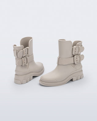 Back and angled view of a pair of beige Bang Boots with two side buckles