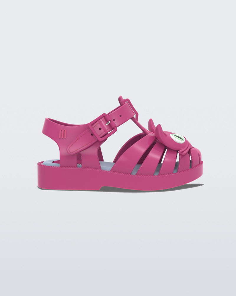 Side view of a pink baby Possession Cat flat