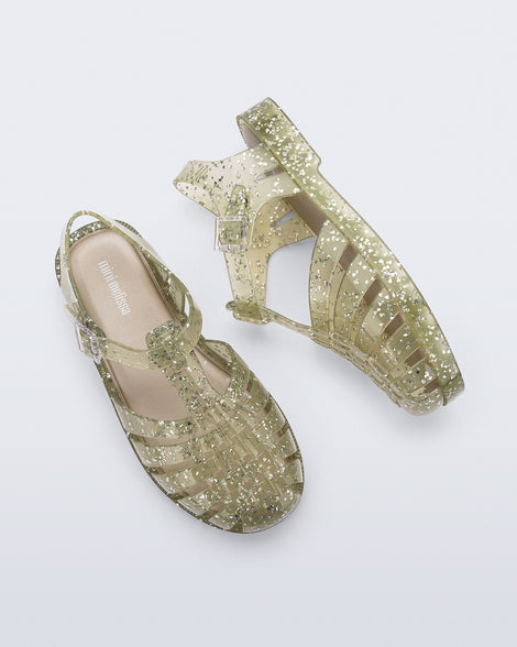 Side and top view of a pair of yellow Possession kids sandals with heart glitter