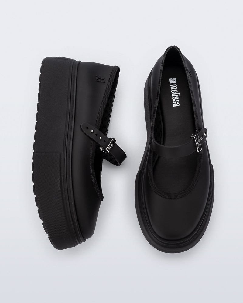 top and side view of a pair of black Soft Ballerina Platform flats