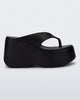 Side view of a black Free Thong  Wedge Platform heel