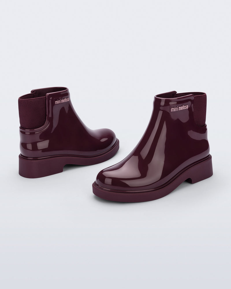 Back and side view of a pair of burgundy Chelsea II kids boots