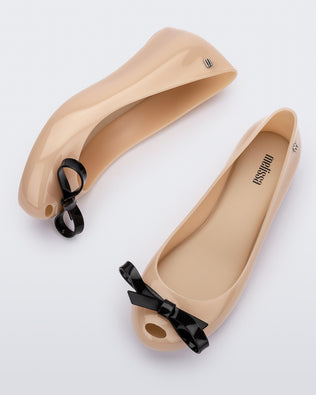 Product element, title Ultragirl Bow in Beige/Black
 price $48.30