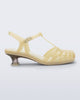 Side view of a milky beige Vixen Kitten Heel sandal