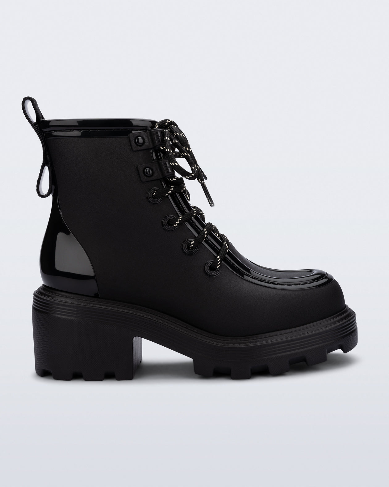 Side view of a black Track Boot with small heel and black laces