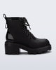 Side view of a black Track Boot with small heel and black laces