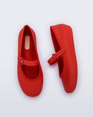 Top and side view of a pair of red Soft Ballerina kids flat with strap