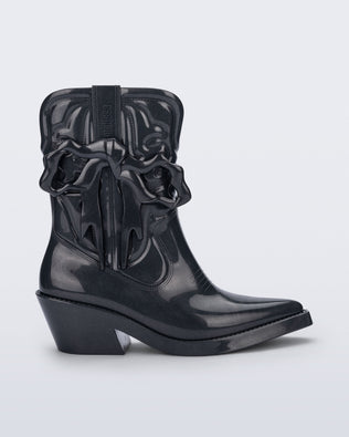 Side view of a metallic grey Texas + Maldito boot