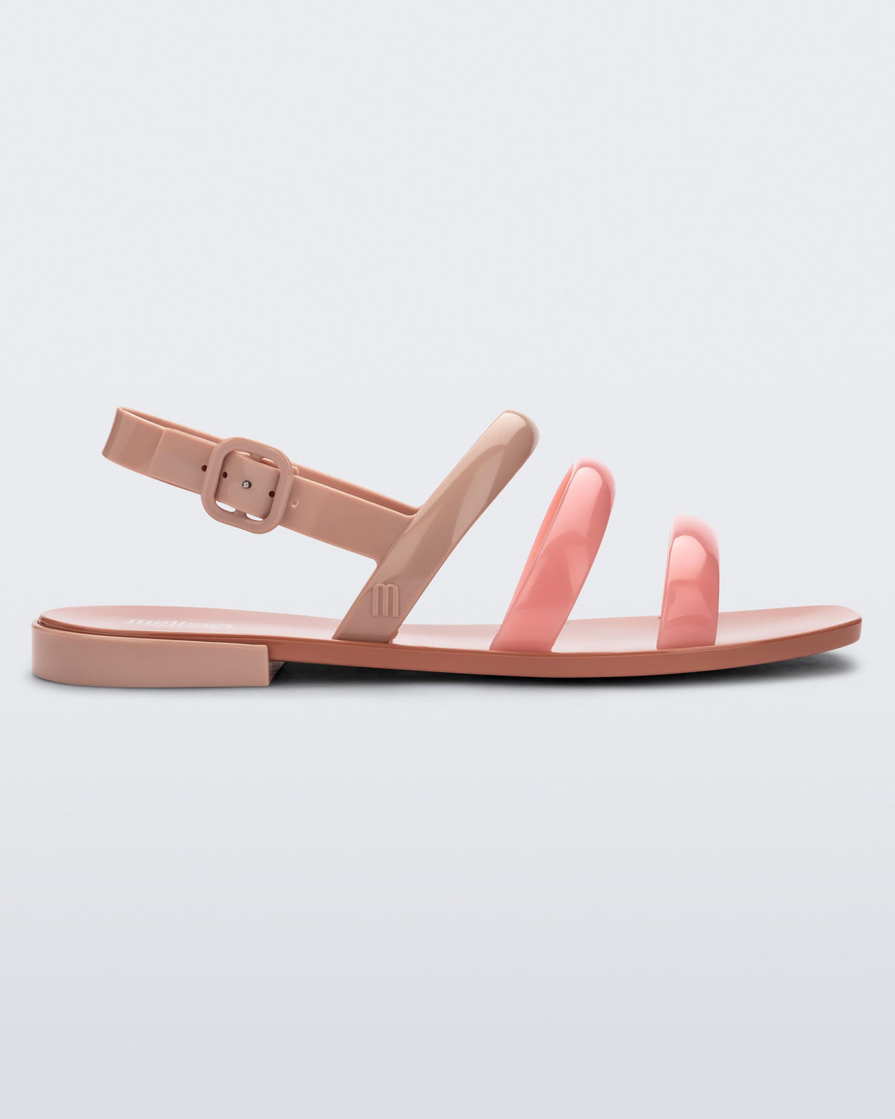 Side view of a beige and pink Essential Wave women's sandal with adjustable buckle.