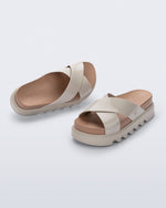 Top and angled view of a pair of beige/brown Cozy Cross platform sandals with crisscross top straps