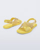 Back and angled view of a pair of yellow Cleo sandals with back strap and crisscross top straps