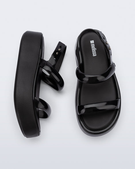 Top and side view of a pair of black Wave Platform sandals with top and heel straps