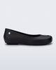 Side view of a black Ultragirl Futura ballerina flat