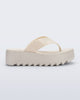 Side view of a beige Thong Platform flip flop