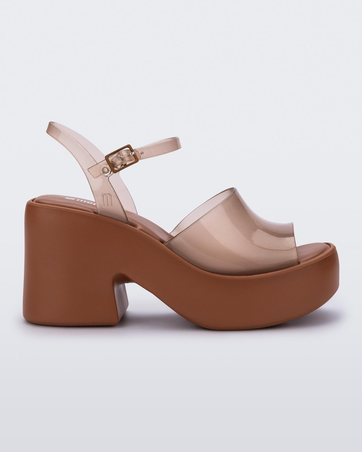 Side view of a clear brown Lina platform heel