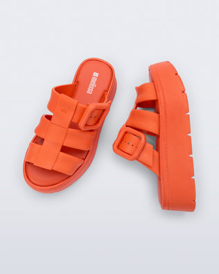Top and side view of a pair of orange of pink Pump Platform sandals