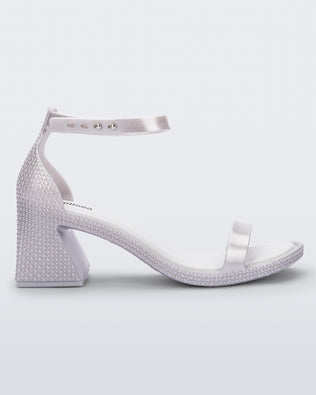 Product element, title Lux Heel in Metallic Silver/White
 price $59.50