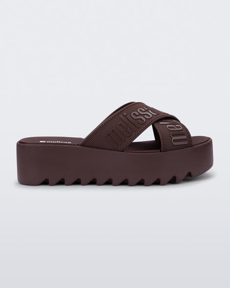 Side view of a brown M Lover Cross Strap platform slide
