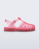 Side view of a pink Possession kids sandal with heart glitter
