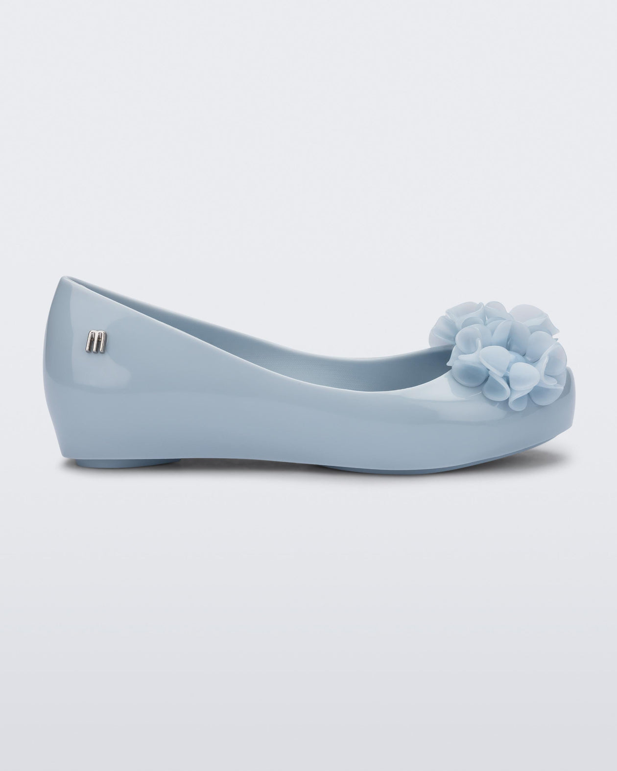 Side view of a blue Ultragirl Springtime kids flat with two blue flowers and peep toe.