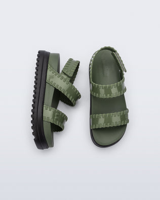 Top and side view of a pair of green Dune Platform Sandals with faux stitching on the straps and black sole.