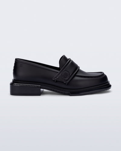 Side view of a black Spencer loafer