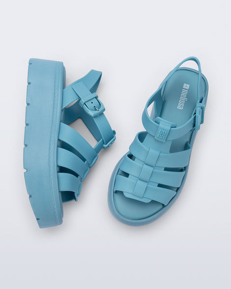 Top and side view of a pair of blue Up Platform sandals