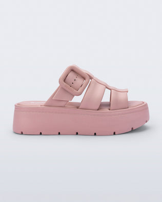 Side view of a pink Pump Platform sandal