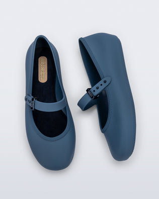 Top and side view of a pair of blue Soft Ballerina kids flat with strap