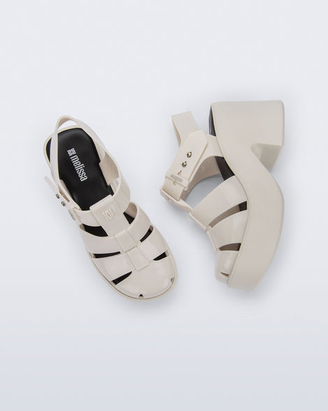 Top and side view of a pair of beige Lulu platform heel fisherman sandals