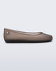 Side view of a clear brown Soft Ballerina Essential Flat