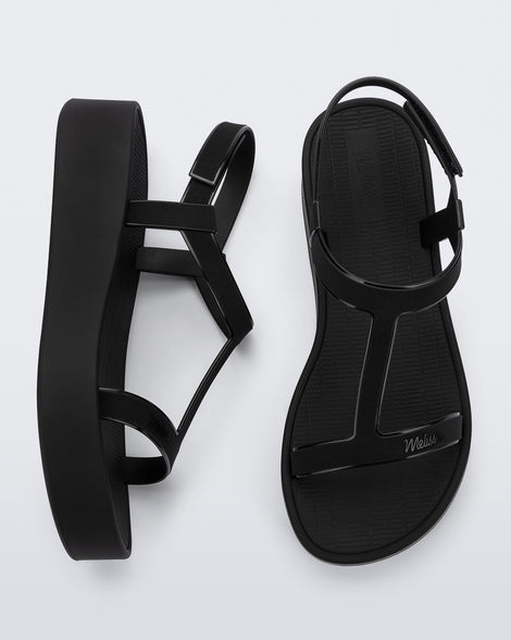Top and side view of a pair of black Sun Capri Platform sandals with ankle straps