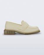 Side view of a beige Spencer loafer with clear beige sole