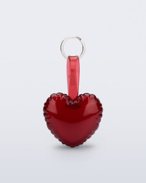front view of a red Heart bag charm