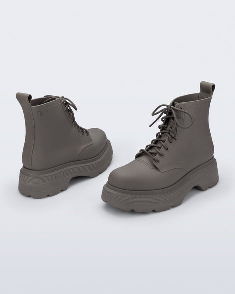 Back and front angled view of a pair of matte brown Coturno Soft Platform boots