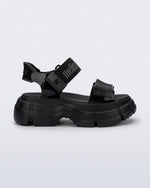 Side view of a black Pulse platform sandal with straps