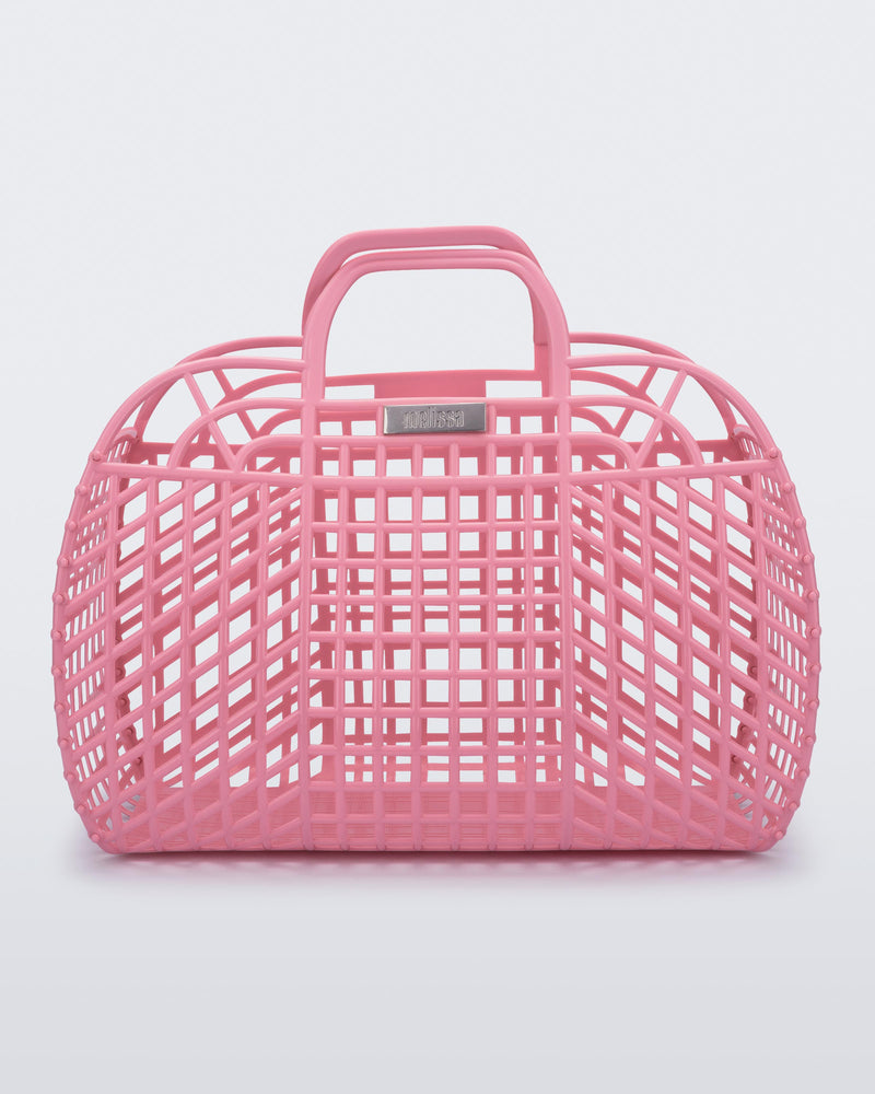 Front view of a pink Refraction bag with handles