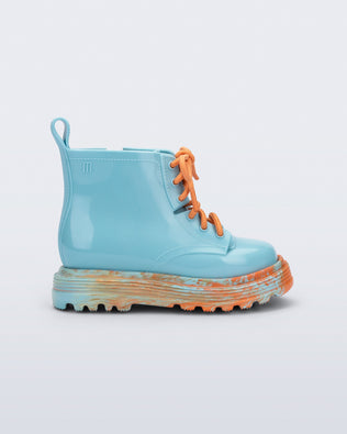 Product element, title Coturno in Blue/Orange
 price $26.00