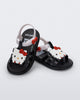 Angled view of a pair of black Hip + Hello Kitty and Friends sandals with white ankle straps and Hello Kitty on upper