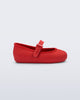 Side view of a red Soft Ballerina baby flat with Velcro strap