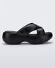 Side view of a black Free Rise platform slide sandal