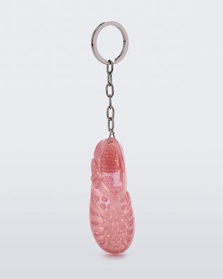 Front view of glitter pink Possession keyring