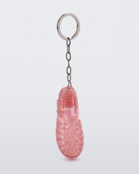 Front view of glitter pink Possession keyring