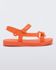 Side view of a orange Sun Downtown baby sandal