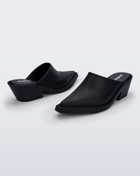 Side and angled view of a pair of matte black Texas Mule heels