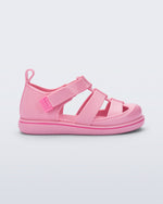 Side view of a pink Smash closed toe baby sandal